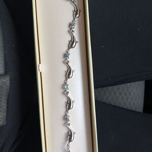 Silver Dolphin Link Bracelet with Blue Stones